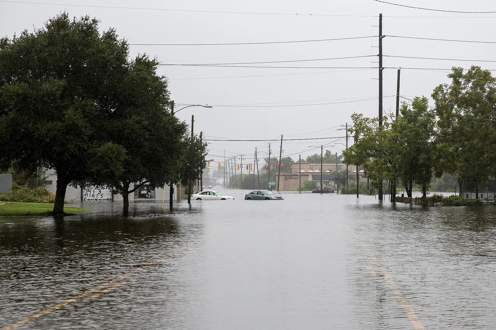 Water covers a street in North Charleston during an earlier flood caused by heavy rain. The picture does not show this week's tides.