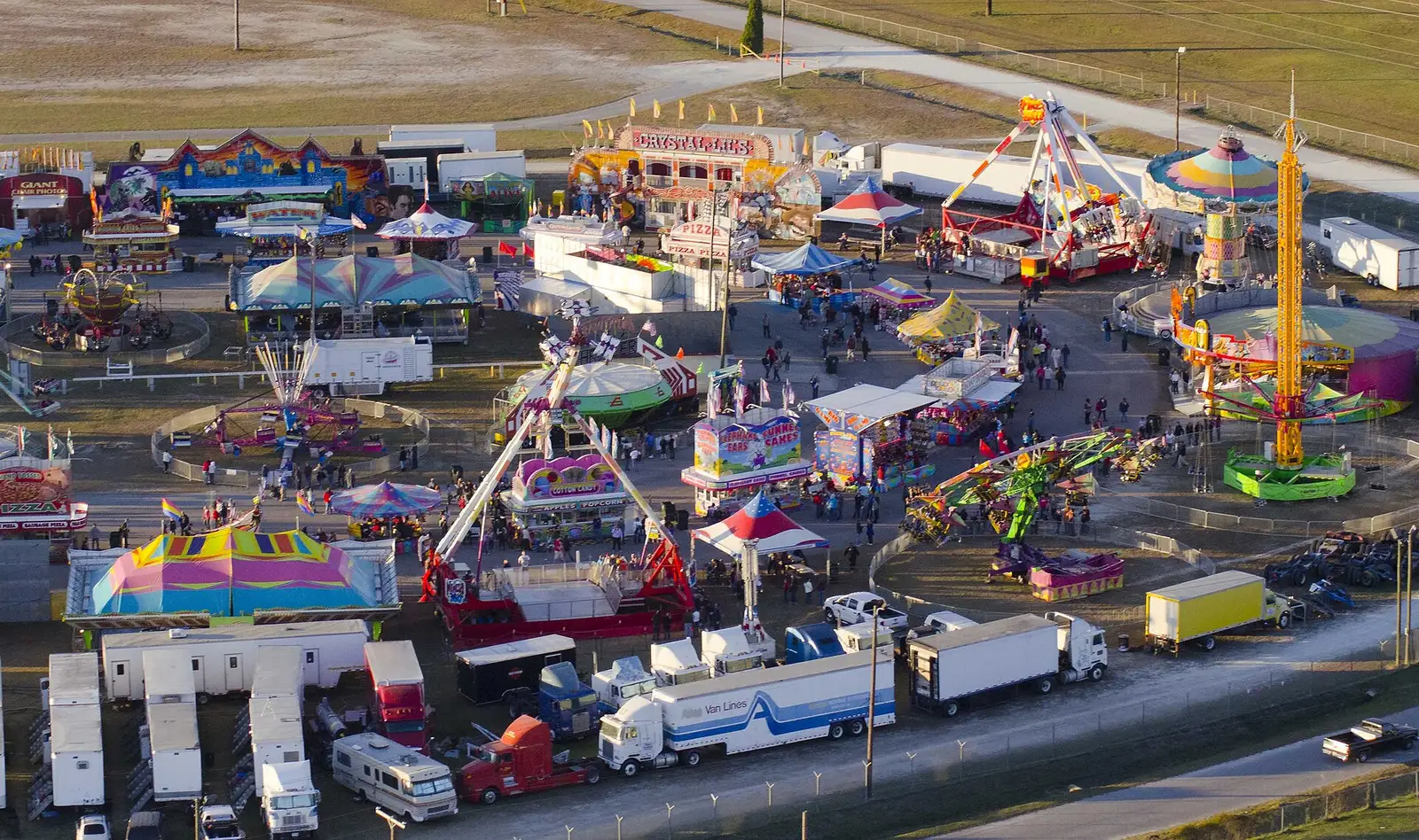 Rides, game booths and the midway of the Coastal Carolina Fair at Exchange Park in Ladson, seen from the air.