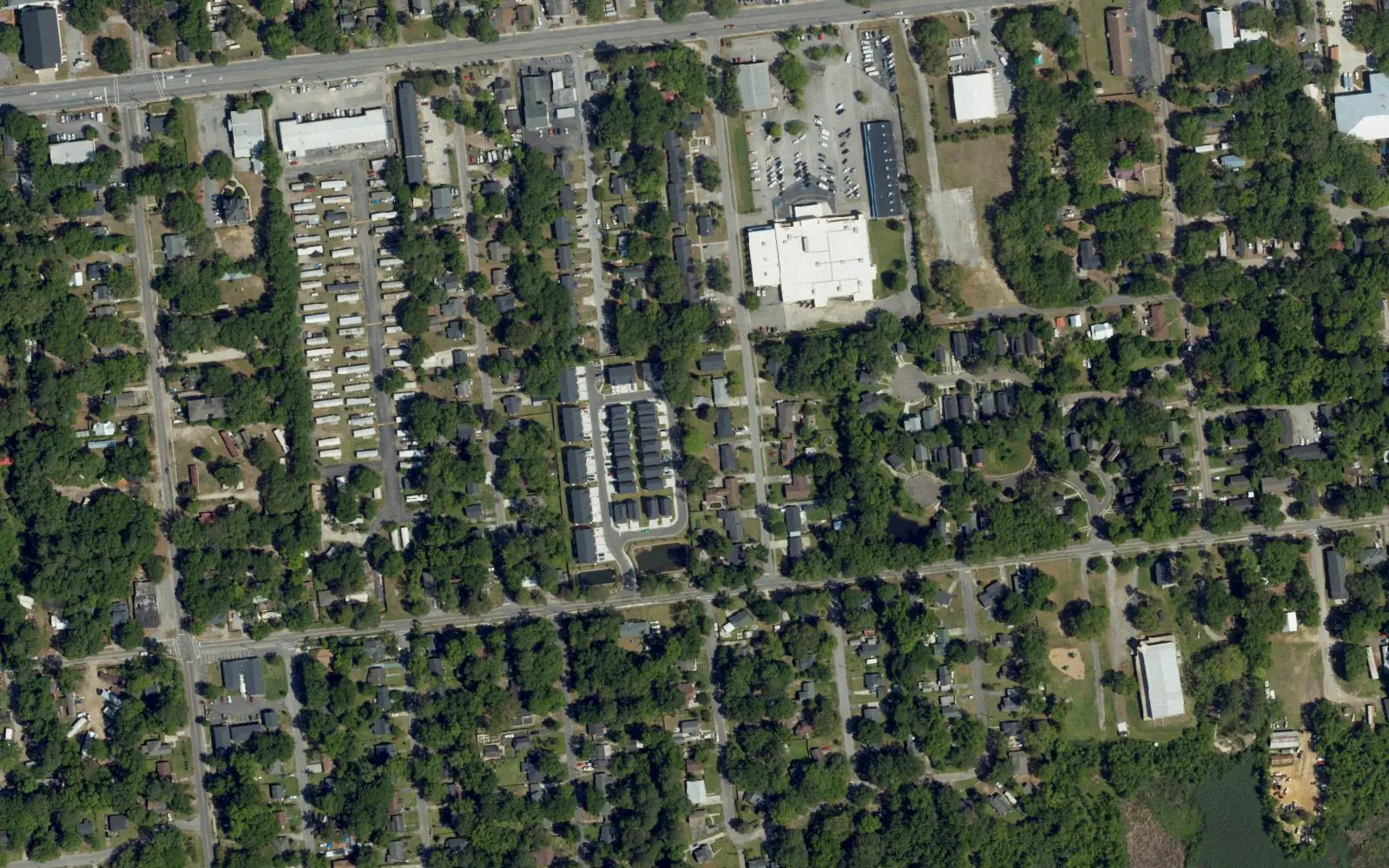 Aerial view of houses and tree-lined streets in Charleston Farms, North Charleston.