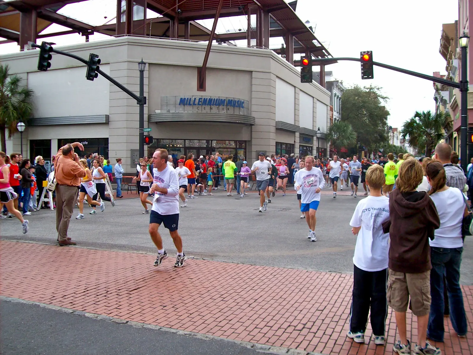 Runners in the Turkey Day Run head down a downtown Charleston street toward the finish on Thanksgiving morning.