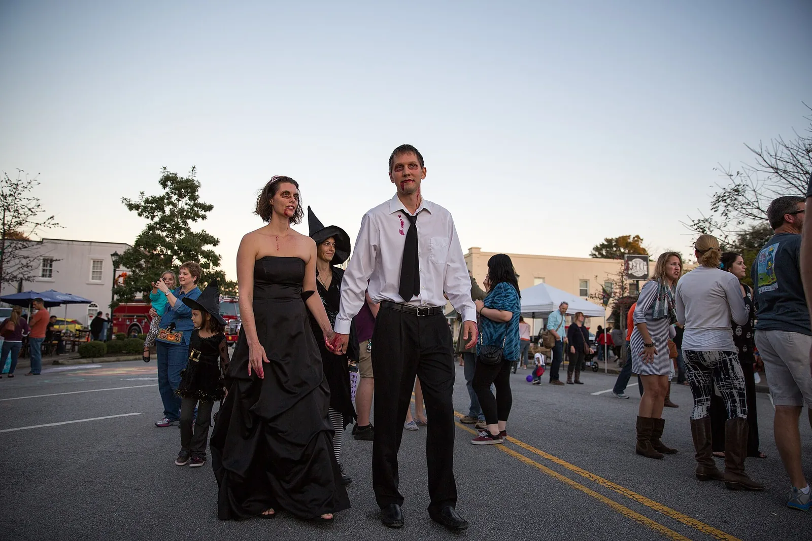 Costumed festivalgoers crowd East Montague Avenue during the North Charleston Harvest Festival, one of the city's free street festivals.