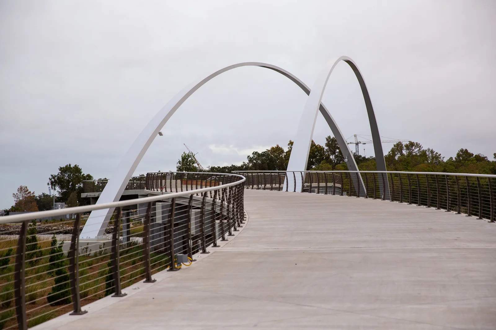 The arched Noisette Creek Pedestrian Bridge, which links Riverfront Park to green space north of the creek in North Charleston.